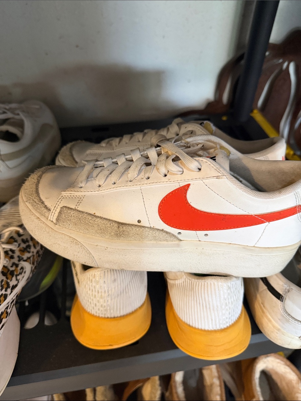 Nike Men’s White Sneakers with Orange Swoosh